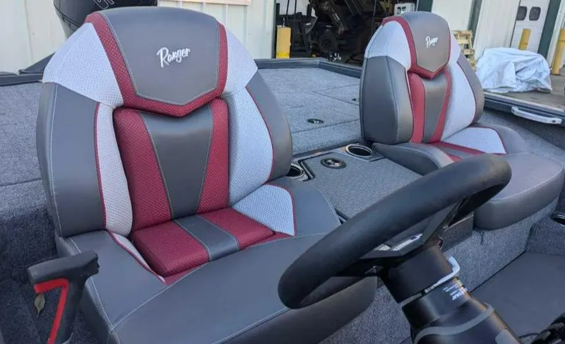 Slide: The Image of 2025 Ranger ALPHA 208 boat seats with red and gray upholstery. - 5