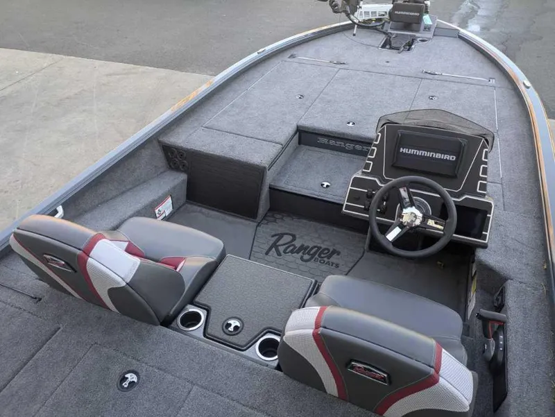 Slide: The Image of 2025 Ranger ALPHA 208 boat interior with dual seats and Hummingbird navigation system. - 7