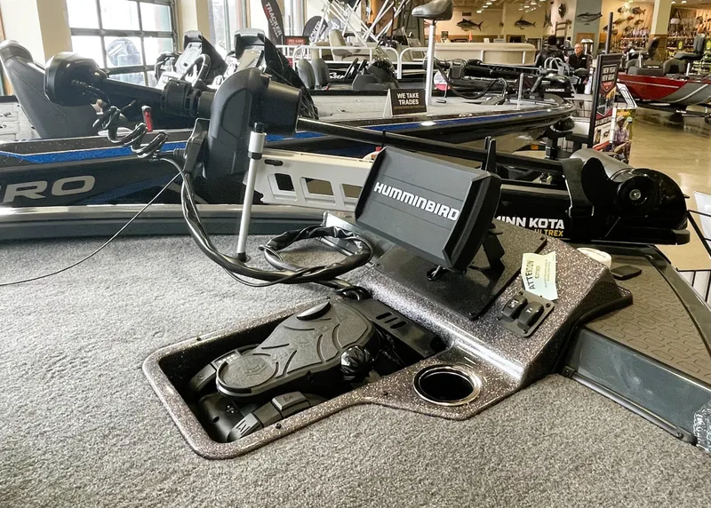 Slide: The Image of 2025 Ranger ALPHA 208 boat with Humminbird and Minn Kota equipment in showroom. - 9