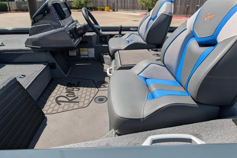 Slide: The Image of Interior of 2025 Ranger ALPHA 208 boat with blue and gray seating. - 8