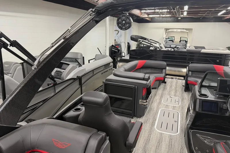 Slide: The Image of 2025 Bennington M Line pontoon boat interior with sleek seating and modern design. - 12
