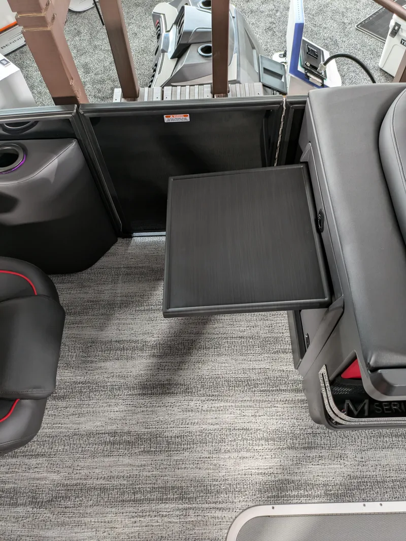 Slide: The Image of Close-up of a Rockford Fosgate speaker on a 2025 Bennington M Line boat. - 14