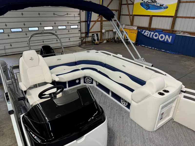 Slide: The Image of 2024 JC Neptoon 23 TT LG pontoon boat with spacious seating and modern helm. - 11