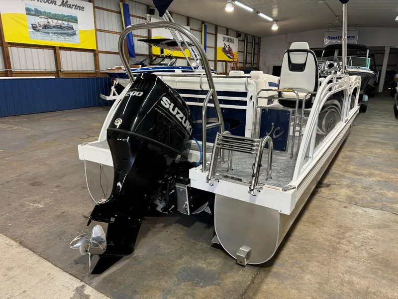 Slide: The Image of 2024 JC Neptoon 23 TT LG pontoon boat with Suzuki engine in showroom. - 9