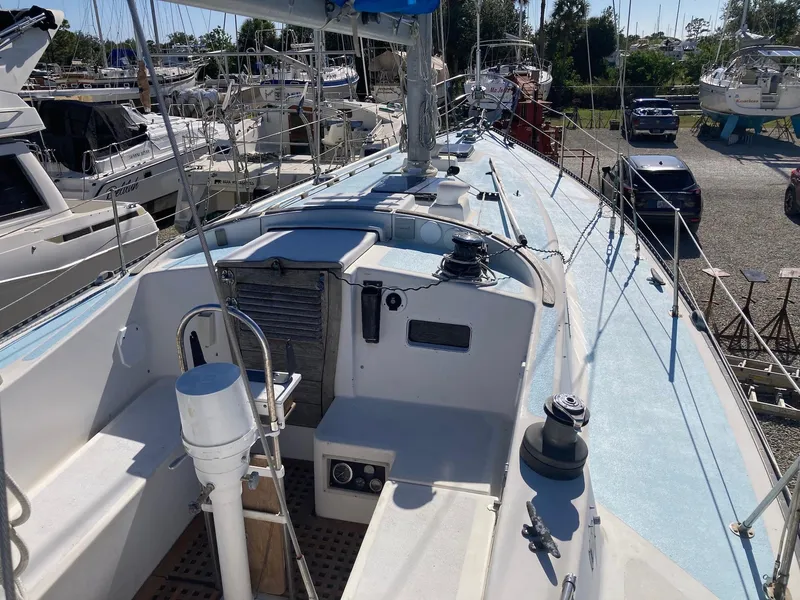 Slide: The Image of 1975 Northstar Hughs 80/20 Center Cockpit sailboat in marina, view of deck and cockpit. - 5