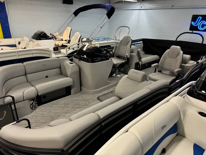 Slide: The Image of 2025 JC Neptoon 23 TT DSL pontoon boat with spacious seating and modern design. - 2