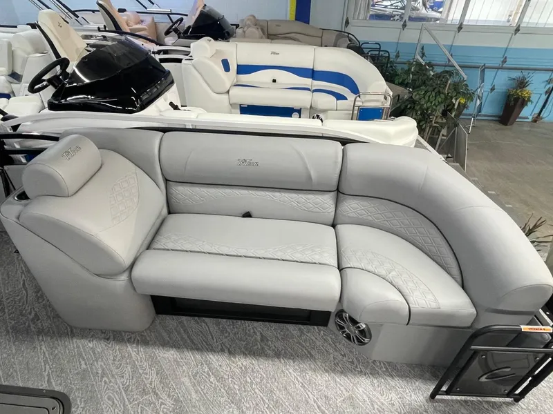 Slide: The Image of 2025 JC Neptoon 23 TT DSL pontoon boat with luxurious gray seating. - 20