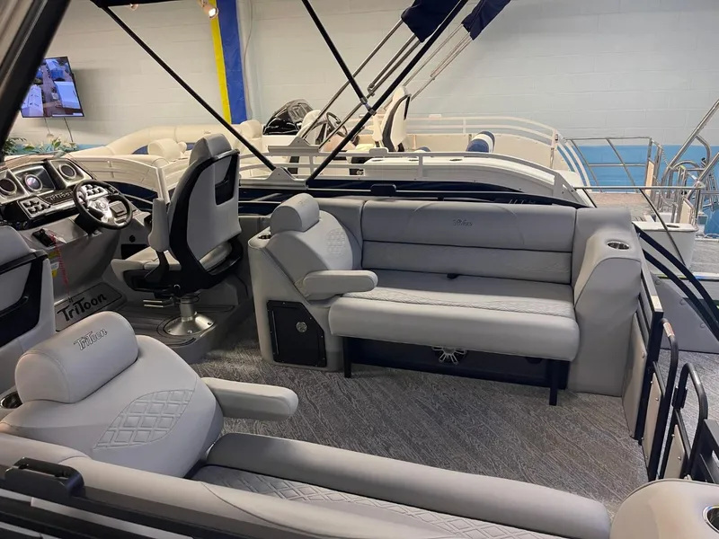 Slide: The Image of Luxurious interior of 2025 JC Neptoon 23 TT DSL pontoon boat. - 21