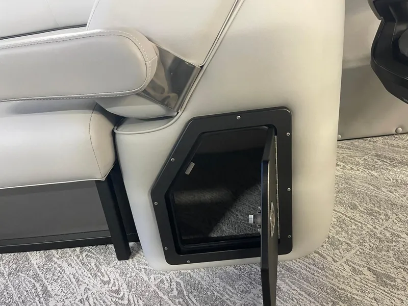 Slide: The Image of 2025 JC Neptoon 23 TT DSL boat seat with open storage compartment. - 25