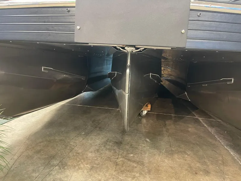 Slide: The Image of 2025 JC Neptoon 23 TT DSL pontoon boat hull, showcasing sleek design and craftsmanship. - 4