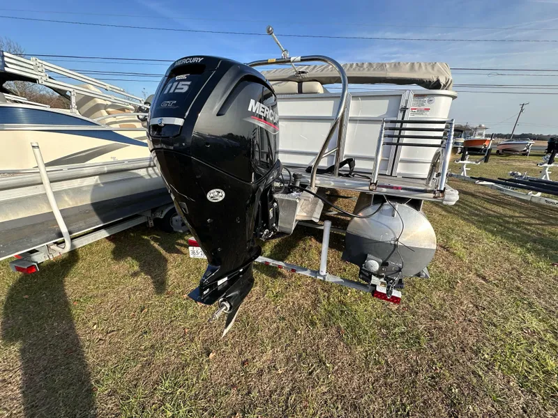 Slide: The Image of 2023 Starcraft EX 22 C SG pontoon boat with Mercury 115 outboard motor. - 5