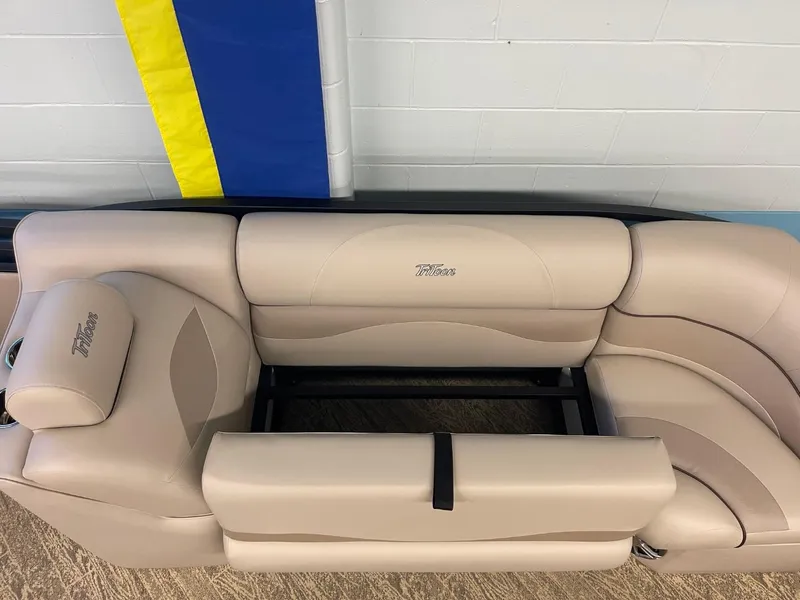 Slide: The Image of 2025 JC Neptoon 23 TT LG boat seating, beige upholstery, indoor display. - 17