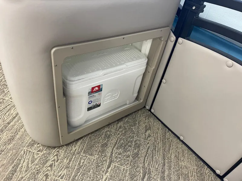 Slide: The Image of Built-in cooler storage on 2025 JC Neptoon 23 TT LG boat. - 19