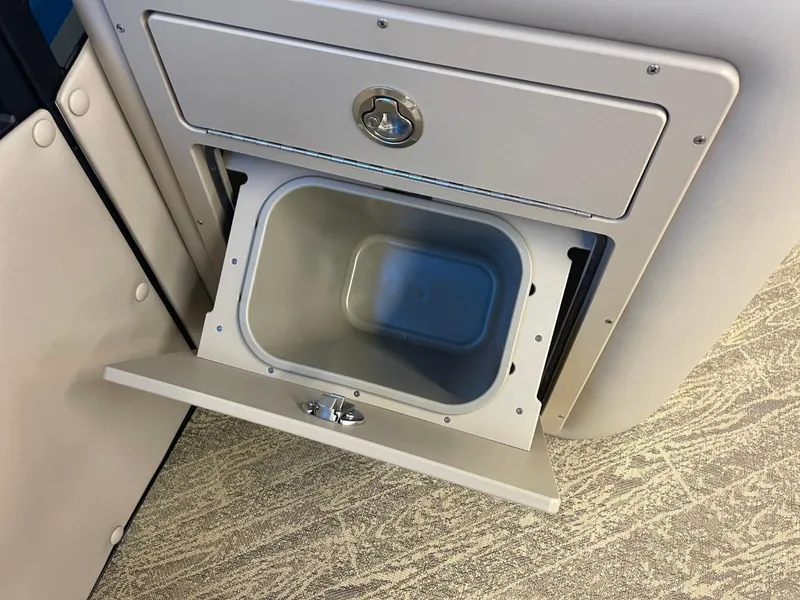 Slide: The Image of Open storage compartment in 2025 JC Neptoon 23 TT LG boat. - 21