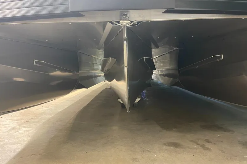 Slide: The Image of Underneath view of 2025 JC Neptoon 23 TT LG pontoon boat hull. - 33