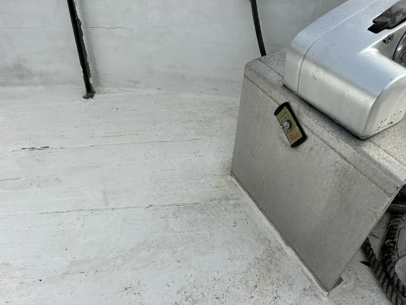 Slide: The Image of Deck of 1972 Grand Banks 42 Classic boat with winch and control panel. - 33