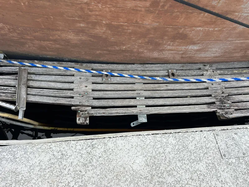 Slide: The Image of Weathered wooden deck of a 1972 Grand Banks 42 Classic boat. - 34