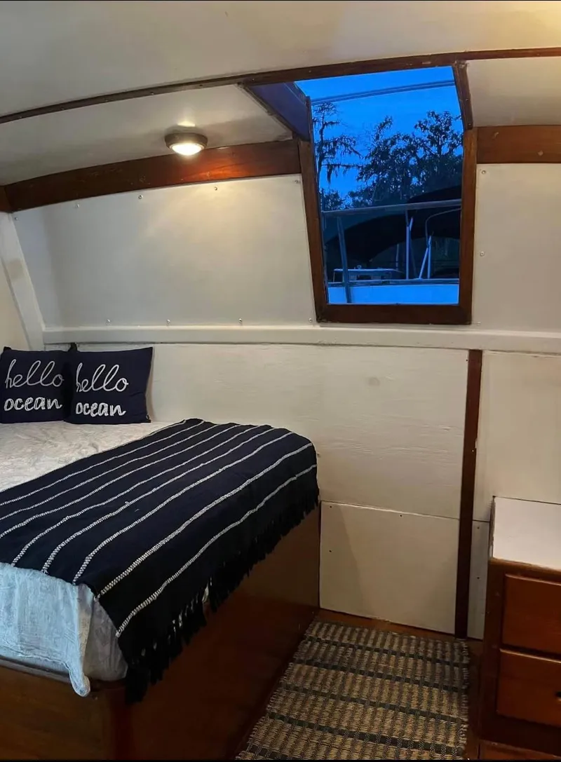 Slide: The Image of Cozy cabin interior of 1972 Grand Banks 42 Classic yacht with nautical decor. - 57