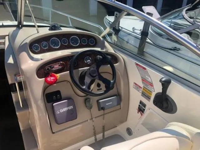 Slide: The Image of 2003 Sea Ray 260 Sundancer boat dashboard with Garmin navigation system. - 10