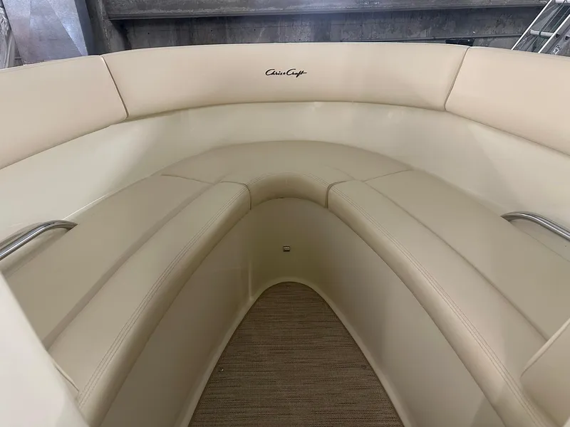 Slide: The Image of 2025 Chris-Craft Launch 27 boat interior with beige seating and elegant design. - 13