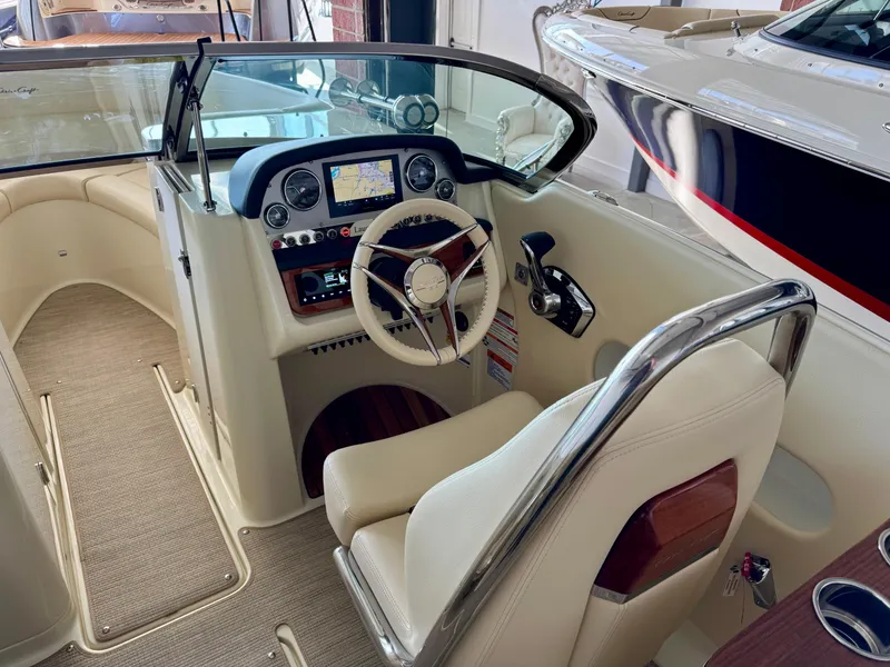 Slide: The Image of 2025 Chris-Craft Launch 27 cockpit with modern controls and luxurious seating. - 7