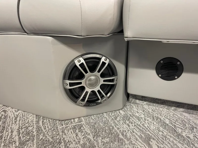 Slide: The Image of 2025 JC Spirit 247TT Sport boat interior with built-in speaker system. - 16