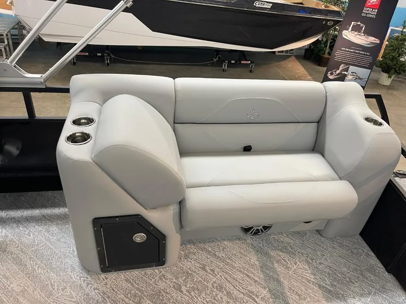 Slide: The Image of 2025 JC Spirit 247TT Sport boat interior with gray seating and cup holders. - 18