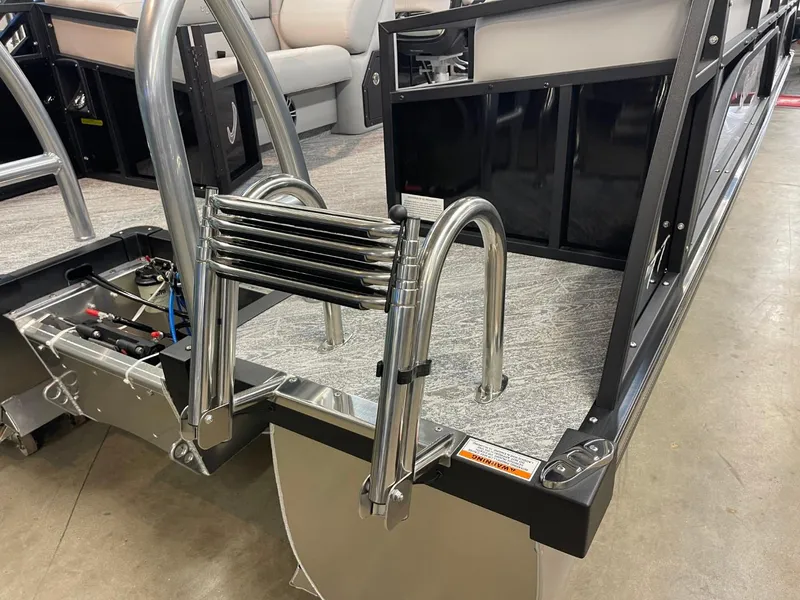 Slide: The Image of 2025 JC Spirit 247TT Sport boat with stainless steel ladder and deck view. - 30