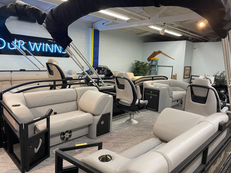 Slide: The Image of 2025 JC Spirit 247TT Sport pontoon boat interior with luxurious seating and modern design. - 34