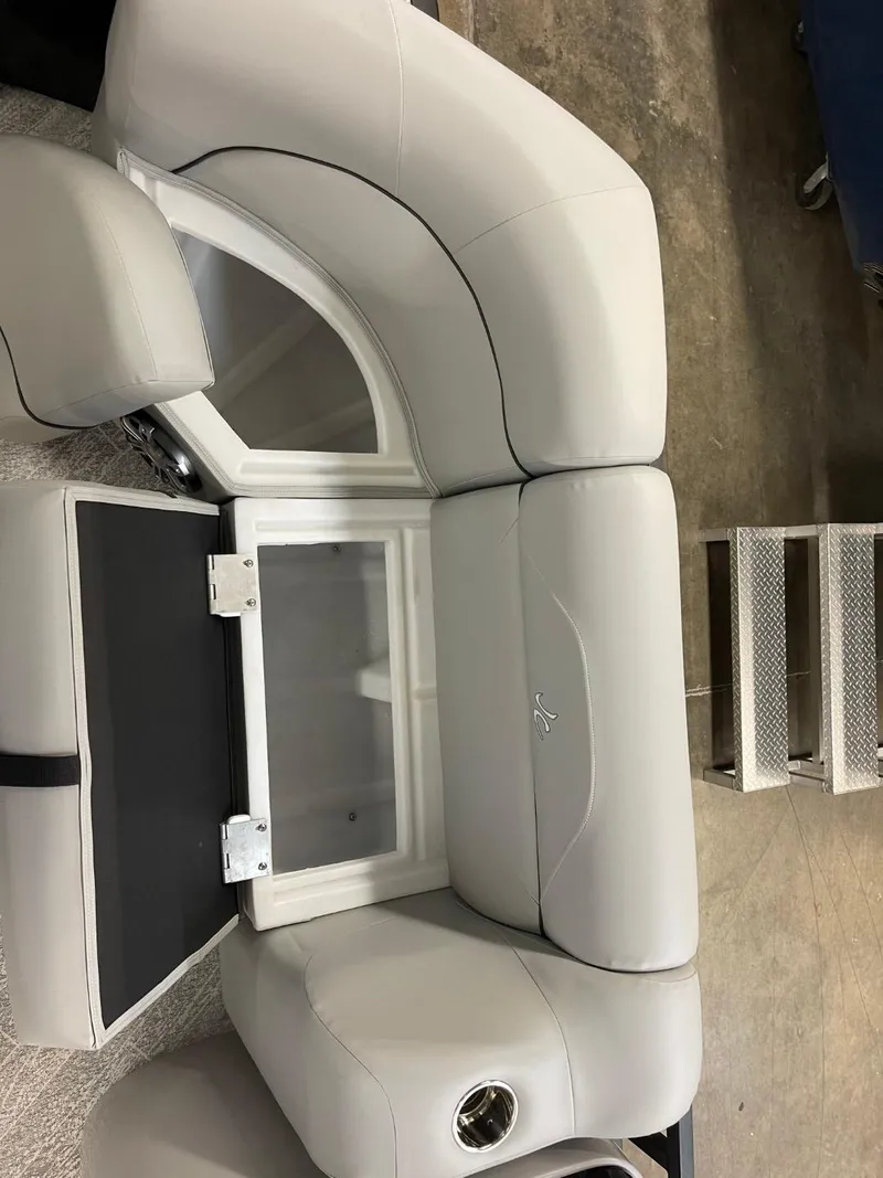 Slide: The Image of 2025 JC Spirit 247TT Sport boat seating with built-in storage compartment. - 8