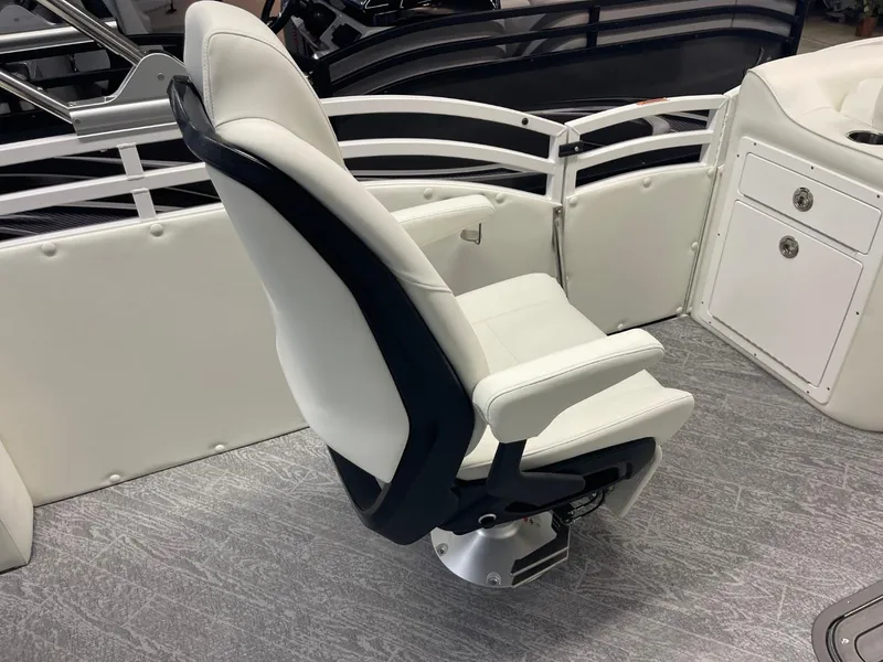 Slide: The Image of Luxury seating on 2025 JC Swingback 25 TT boat, featuring sleek white design. - 35