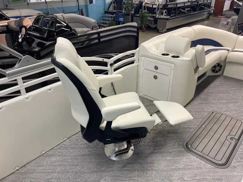 Slide: The Image of 2025 JC Swingback 25 TT boat interior with white seating and modern design. - 36