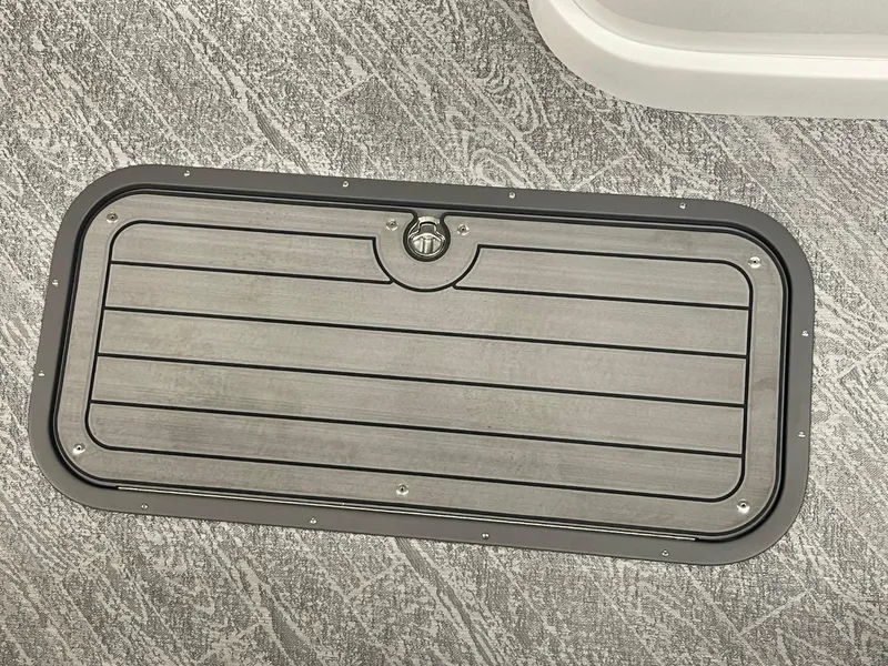 Slide: The Image of 2025 JC Swingback 25 TT boat hatch on textured flooring. - 47