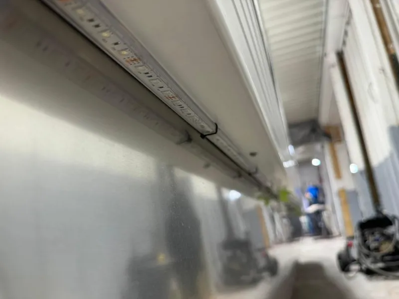 Slide: The Image of Close-up of LED strip lighting on 2025 JC Swingback 25 TT boat. - 8