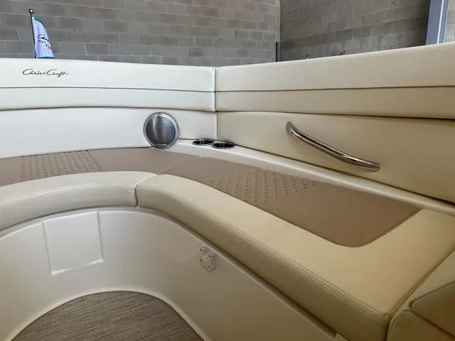 Slide: The Image of Luxurious interior of 2025 Chris-Craft Launch 28 GT boat with beige seating. - 11
