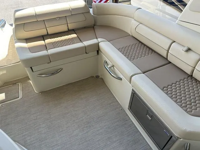 Slide: The Image of 2025 Chris-Craft Launch 28 GT interior with luxurious beige seating and modern design. - 17