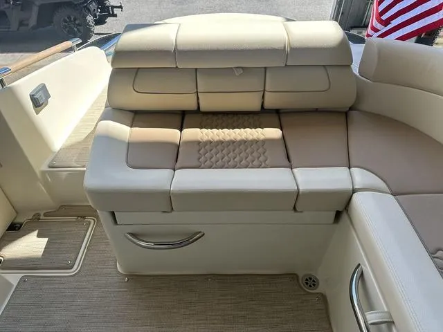 Slide: The Image of 2025 Chris-Craft Launch 28 GT boat interior with beige cushioned seating. - 19