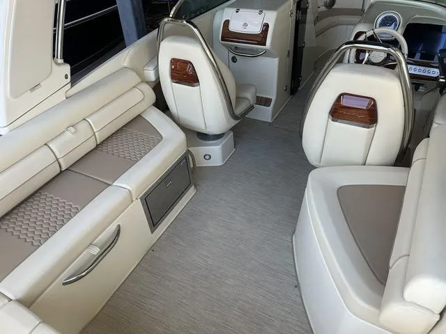 Slide: The Image of Luxurious interior of 2025 Chris-Craft Launch 28 GT boat with elegant seating and dashboard. - 6
