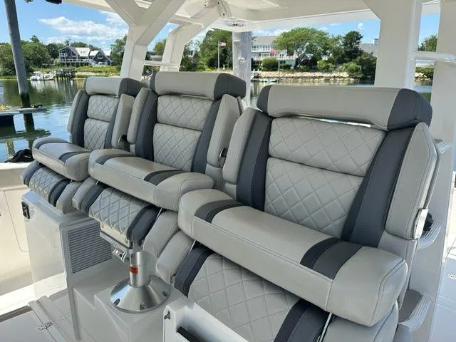 Slide: The Image of Luxurious seating on 2021 Pursuit S 428 Sport boat, featuring quilted leather upholstery. - 39