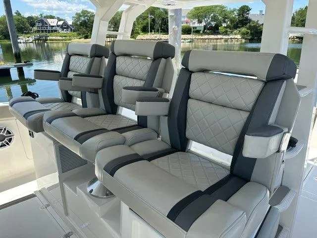 Slide: The Image of Luxurious seating on 2021 Pursuit S 428 Sport boat, featuring quilted upholstery. - 40