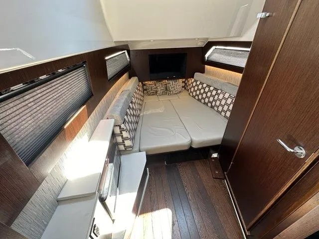 Slide: The Image of Luxurious interior of 2021 Pursuit S 428 Sport boat with cozy seating and modern design. - 45