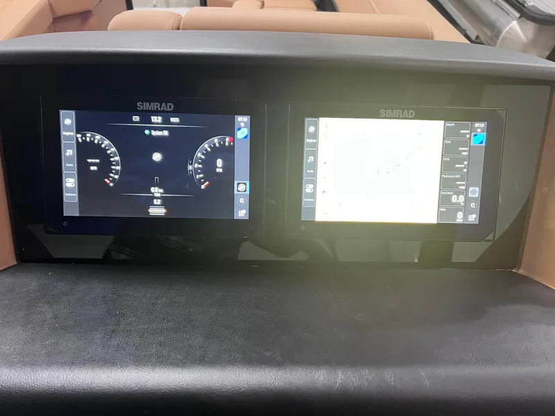 Slide: The Image of Simrad digital displays on 2025 Harris Solstice 250 dashboard. - 18