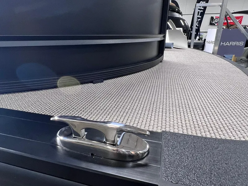 Slide: The Image of 2025 Harris Solstice 250 boat deck with cleat, showcasing modern design and craftsmanship. - 39