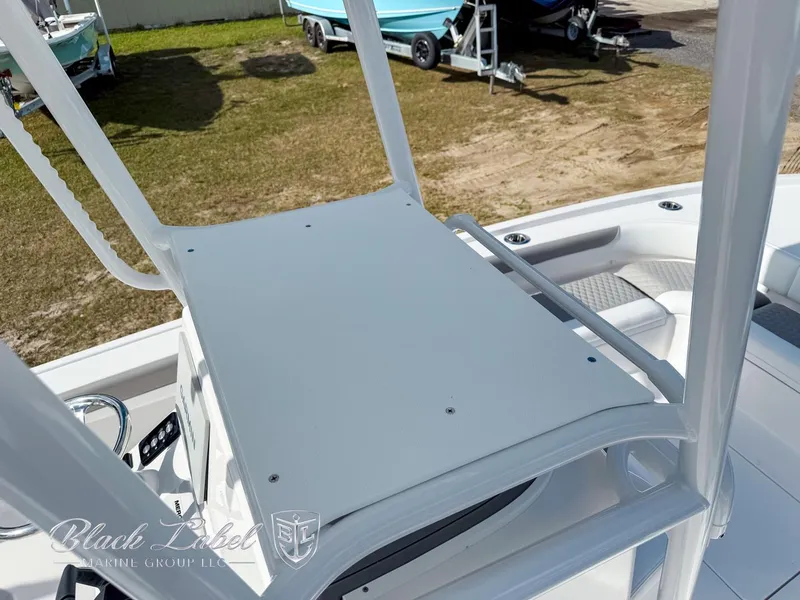 Slide: The Image of 2025 Caymas 281 HB boat interior with helm station and seating area. - 35