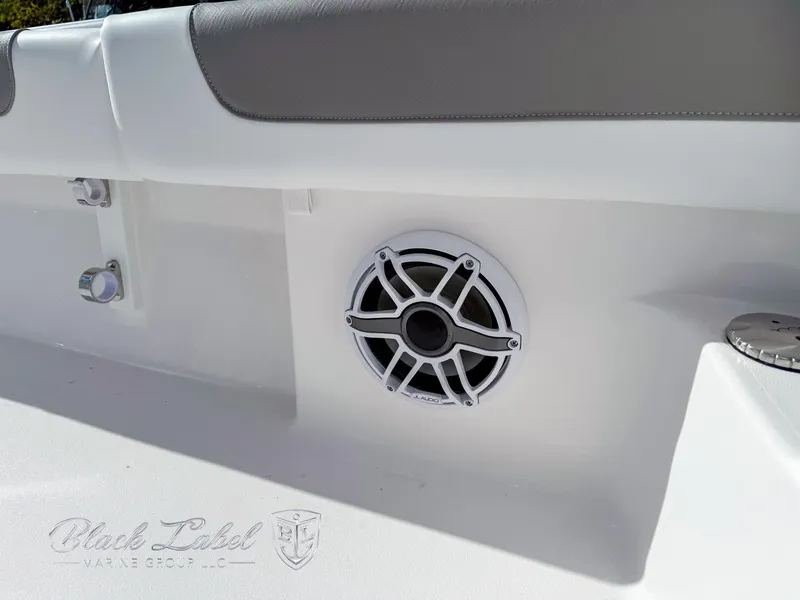 Slide: The Image of 2025 Caymas 281 HB boat interior with speaker and seating detail. - 36
