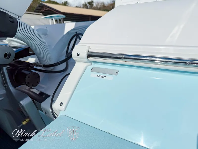 Slide: The Image of 2025 Caymas 281 HB boat detail with Black Label Marine Group branding. - 5