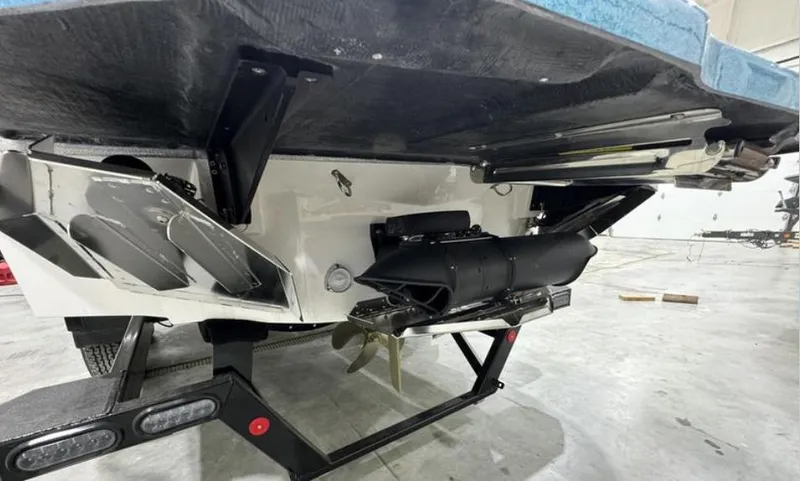 Slide: The Image of 2024 MasterCraft X24 boat interior with gray and white seating, modern design. - 6