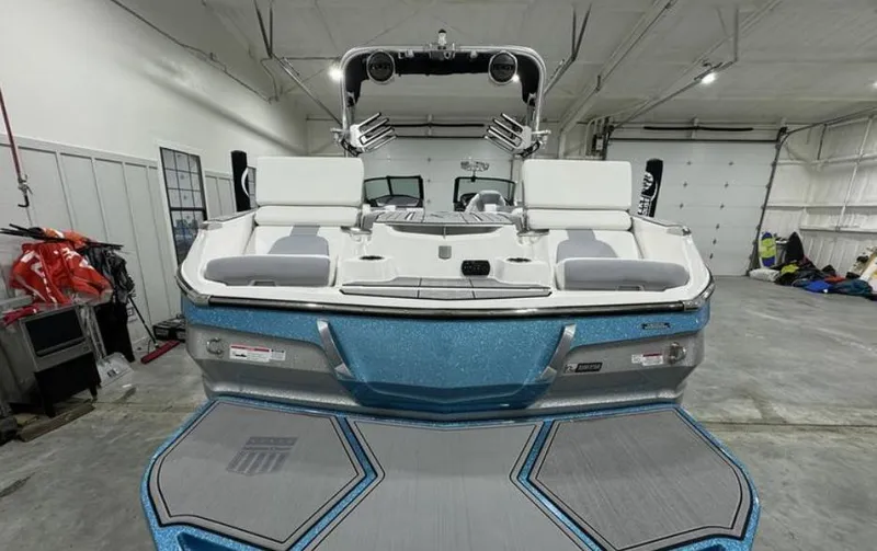 Slide: The Image of 2024 MasterCraft X24 boat interior with modern steering and dashboard controls. - 7