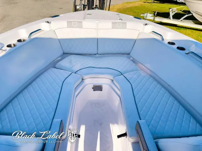 Slide: The Image of 2025 Sea Fox 268 Traveler Dual Console boat with spacious seating and cup holders. - 10