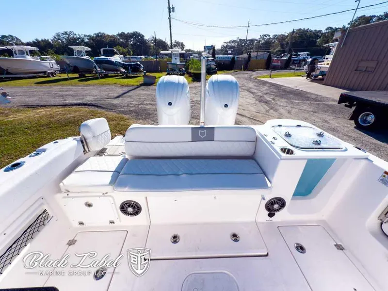 Slide: The Image of 2025 Sea Fox 268 Traveler Dual Console boat interior with seating and storage. - 23